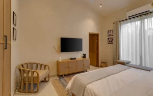 Earthy & Minimalistic Bedroom Seré Resort Goa - Private Pool Villa Resort in Vagator, North Goa
